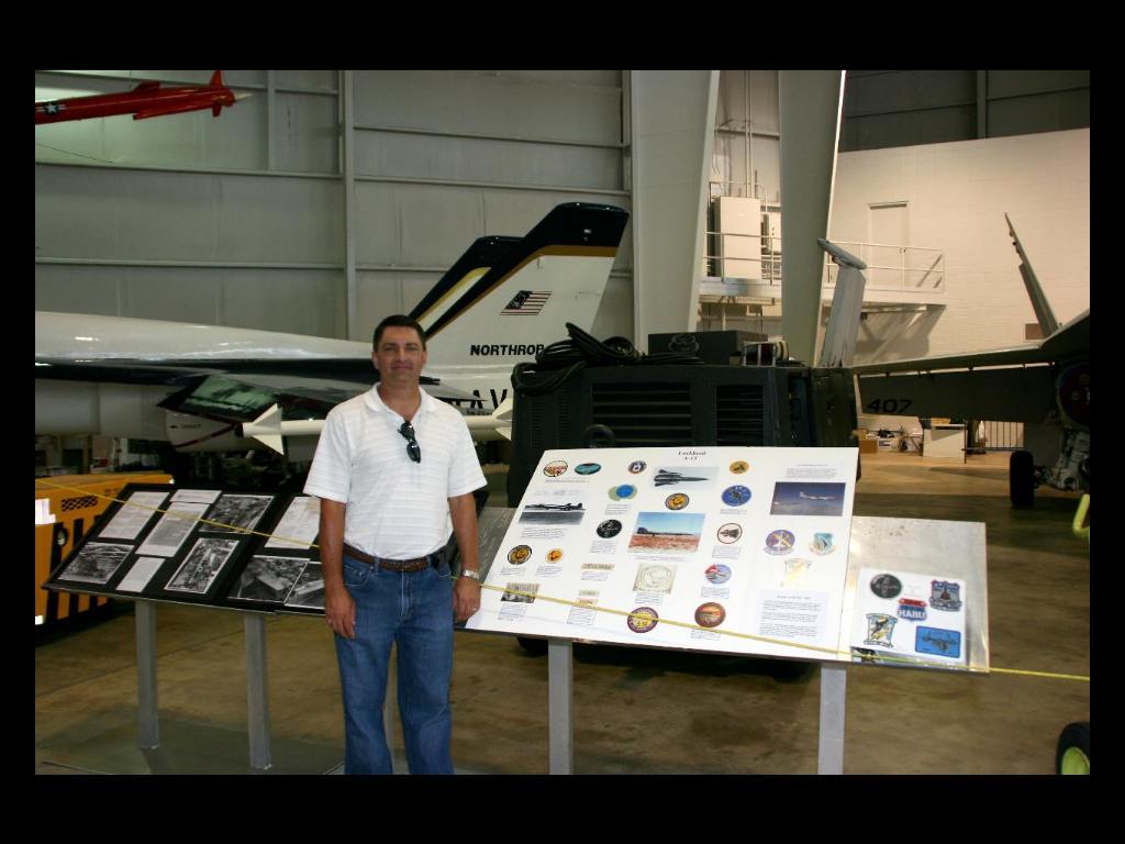 Ron beside the display he donated